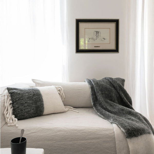 Coussin en laine bicolore