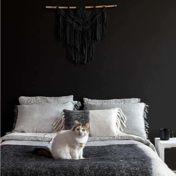 Coussin en laine bicolore